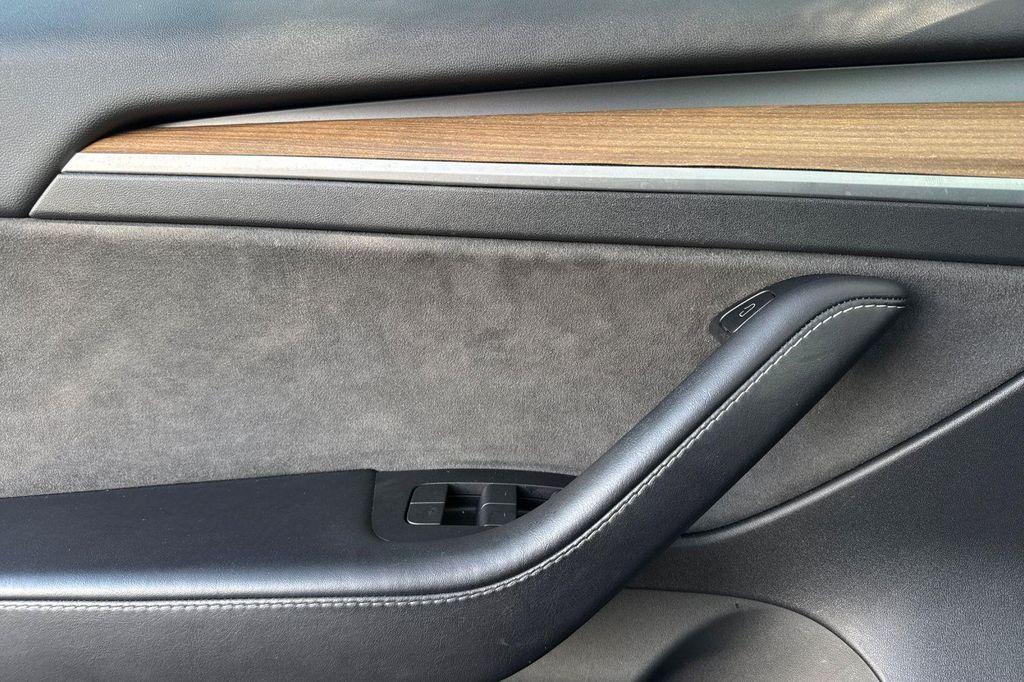 used 2023 Tesla Model 3 car, priced at $19,950