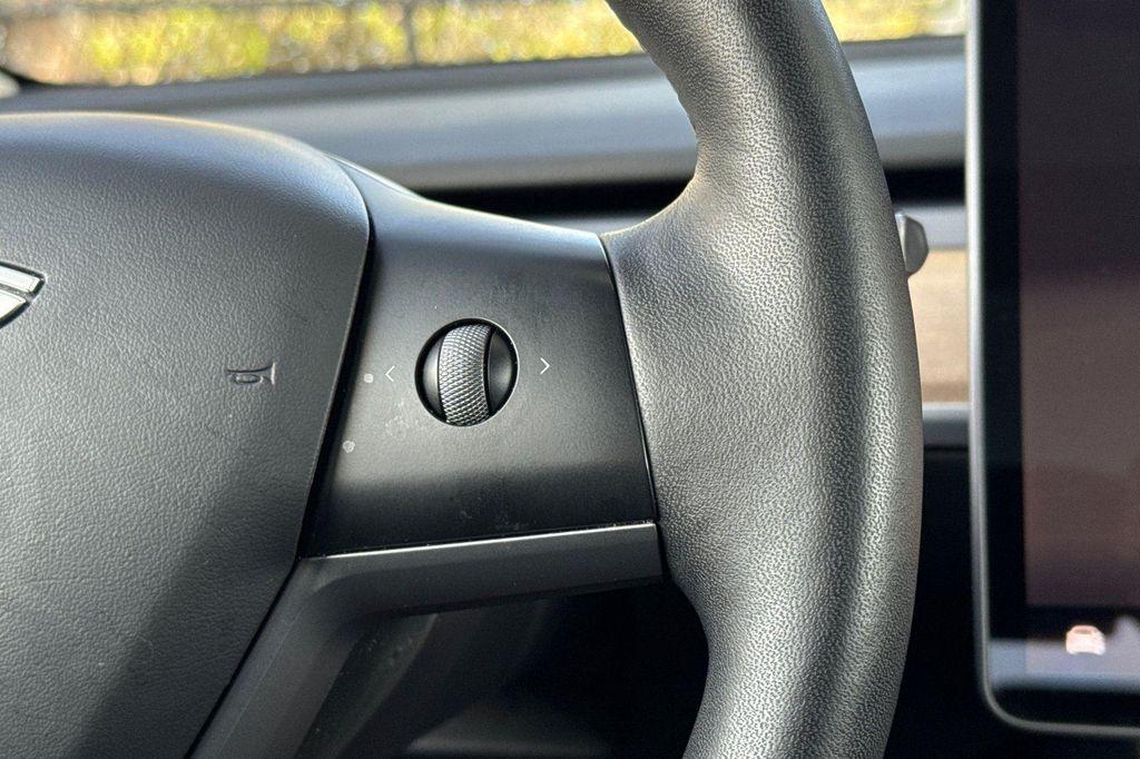 used 2023 Tesla Model 3 car, priced at $19,950