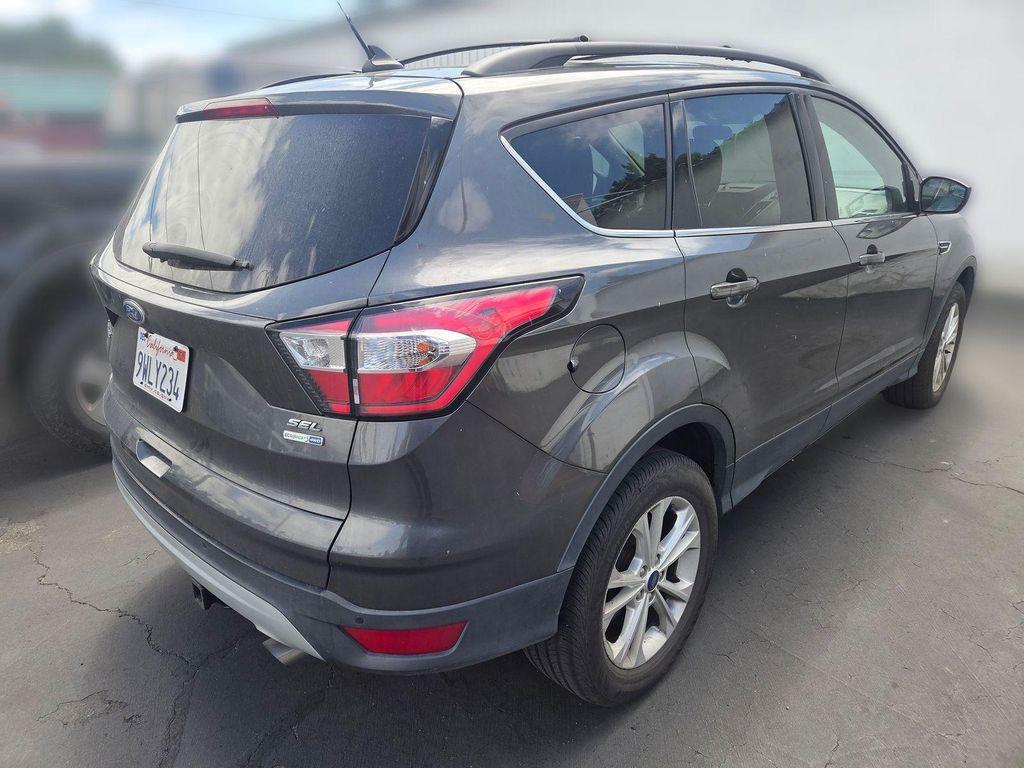 used 2018 Ford Escape car, priced at $13,525