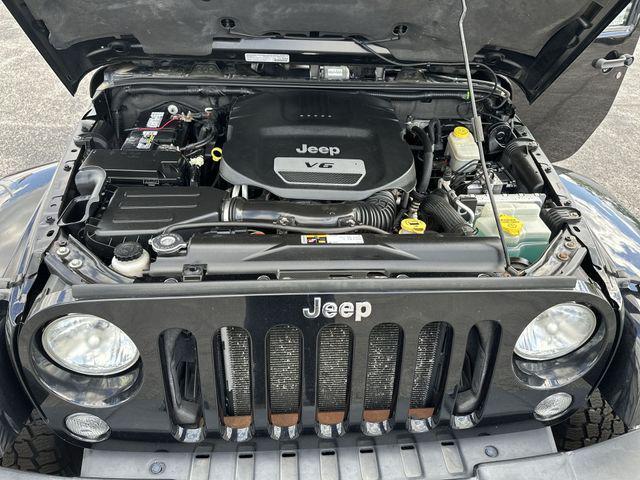 used 2014 Jeep Wrangler Unlimited car, priced at $12,505