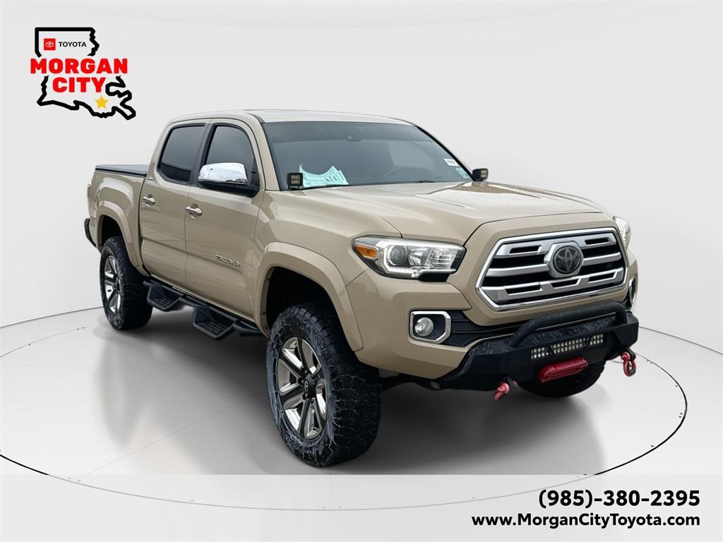 used 2018 Toyota Tacoma car, priced at $30,571