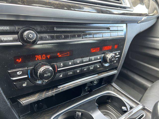 used 2015 BMW 750 car, priced at $14,800