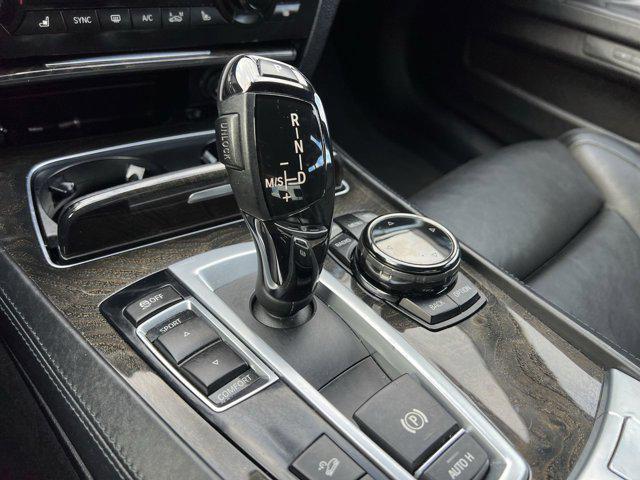 used 2015 BMW 750 car, priced at $14,800