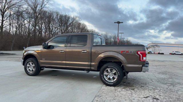 used 2015 Ford F-150 car, priced at $15,000