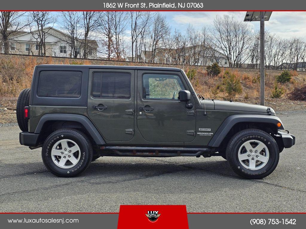 used 2015 Jeep Wrangler Unlimited car, priced at $10,900