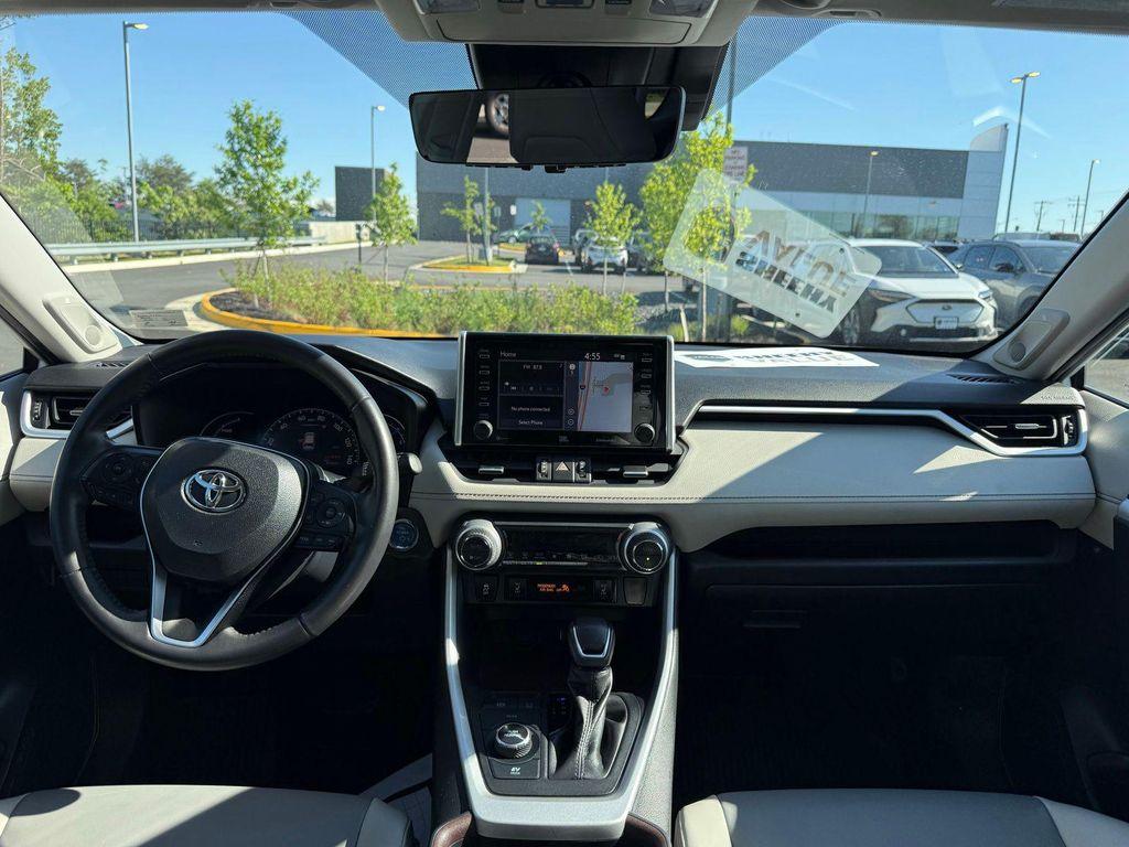 used 2020 Toyota RAV4 Hybrid car, priced at $31,248