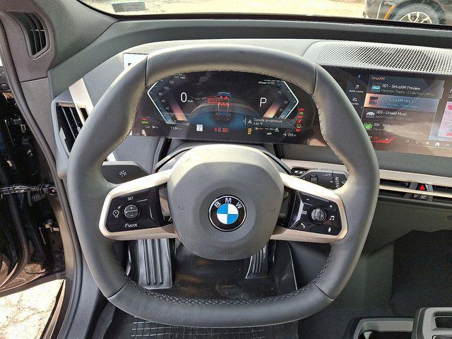 new 2026 BMW iX car, priced at $87,325