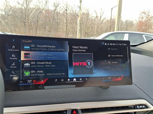 new 2026 BMW iX car, priced at $87,325