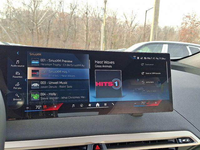 new 2026 BMW iX car, priced at $87,325