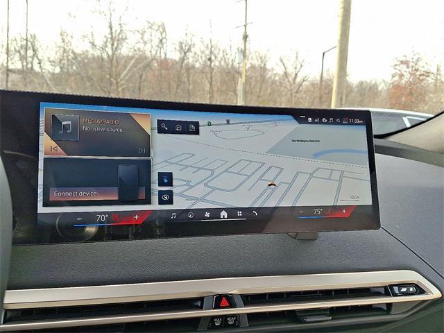 new 2026 BMW iX car, priced at $87,325