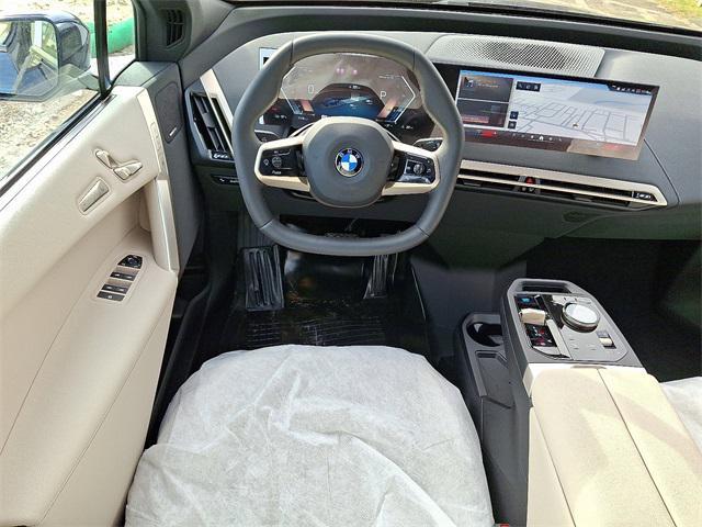 new 2026 BMW iX car, priced at $99,775