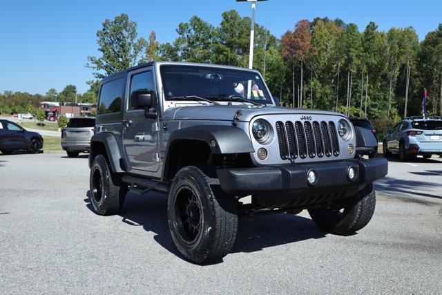 used 2014 Jeep Wrangler car, priced at $19,579