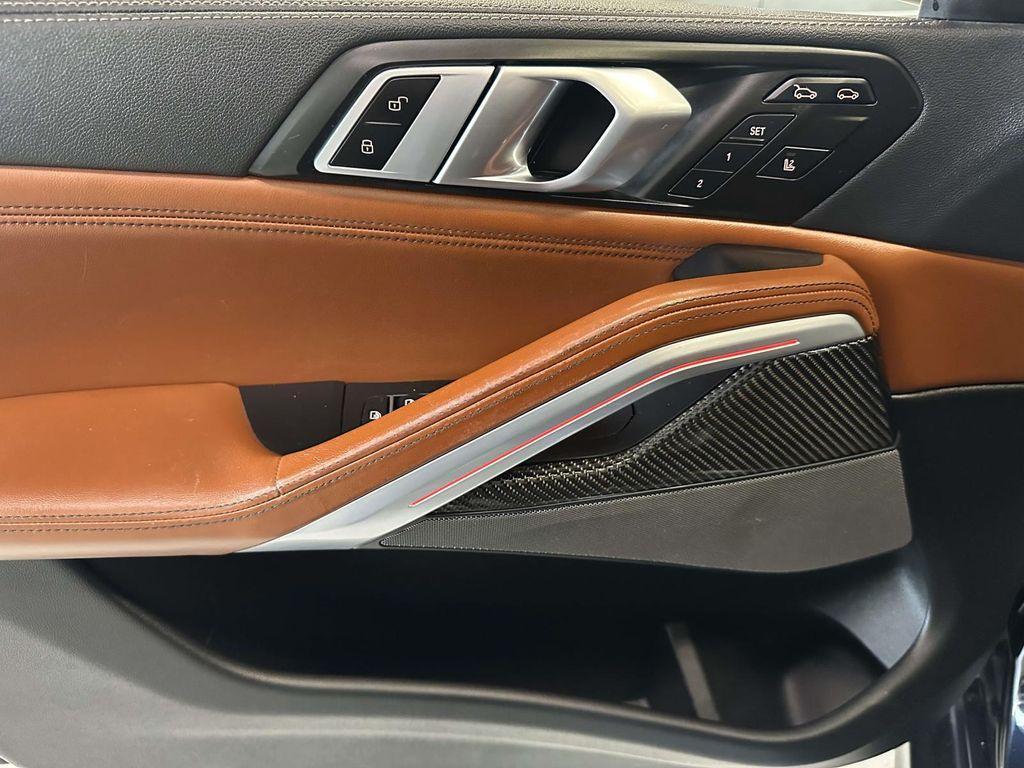used 2023 BMW X6 car, priced at $58,129