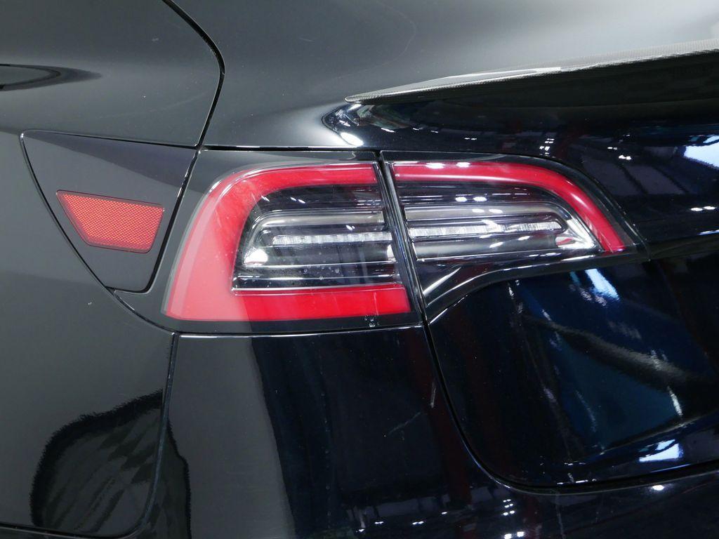 used 2022 Tesla Model 3 car, priced at $33,750