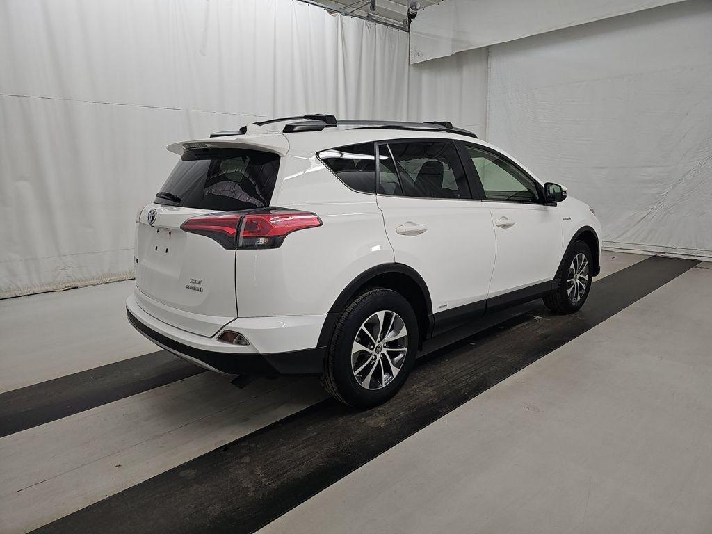 used 2018 Toyota RAV4 Hybrid car, priced at $25,021