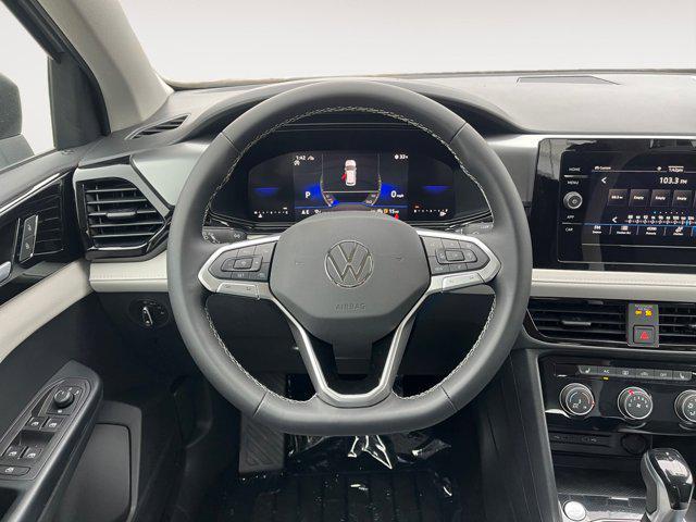 new 2025 Volkswagen Taos car, priced at $23,711