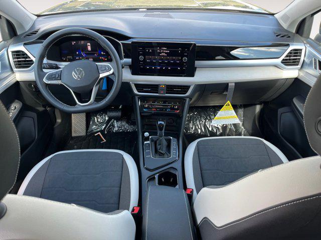 new 2025 Volkswagen Taos car, priced at $27,088