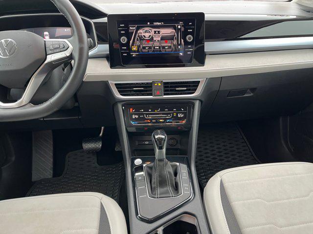 used 2025 Volkswagen Taos car, priced at $24,755
