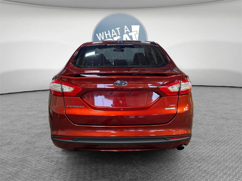 used 2014 Ford Fusion car, priced at $7,499