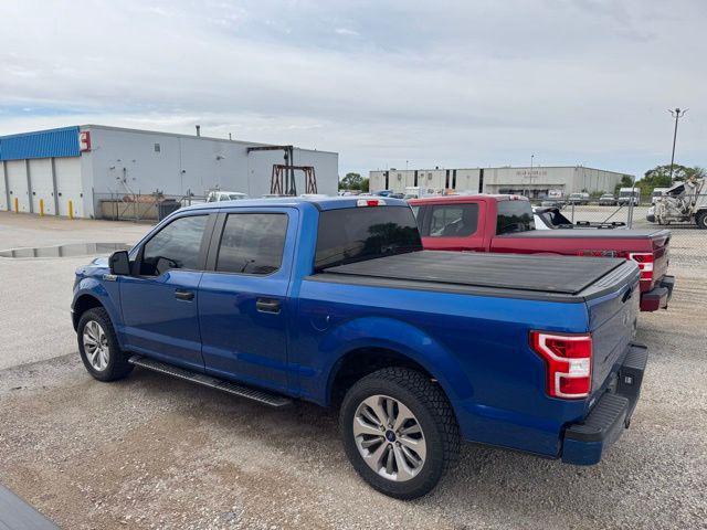 used 2018 Ford F-150 car, priced at $22,559