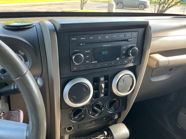 used 2009 Jeep Wrangler Unlimited car, priced at $7,997