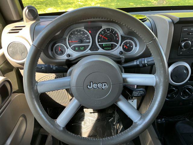 used 2009 Jeep Wrangler Unlimited car, priced at $7,997