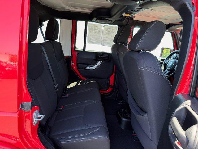 used 2013 Jeep Wrangler Unlimited car, priced at $13,807