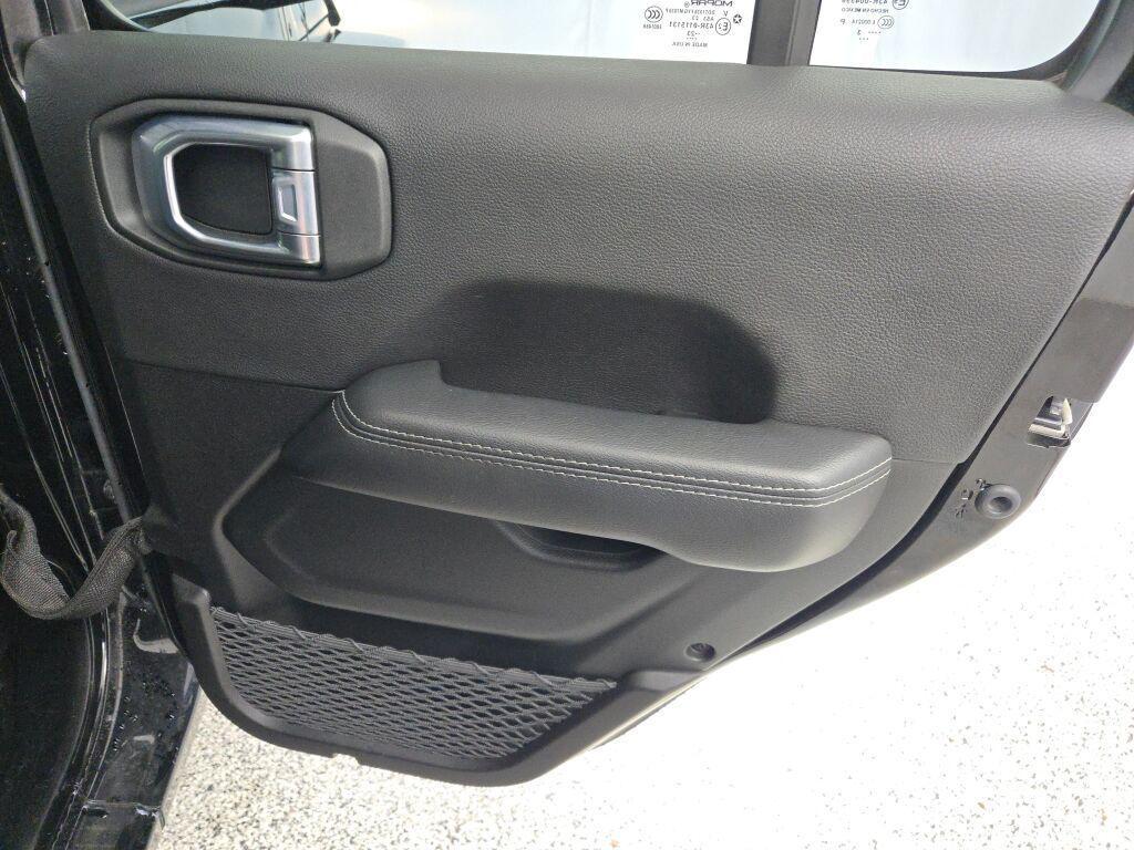 used 2023 Jeep Wrangler car, priced at $28,499