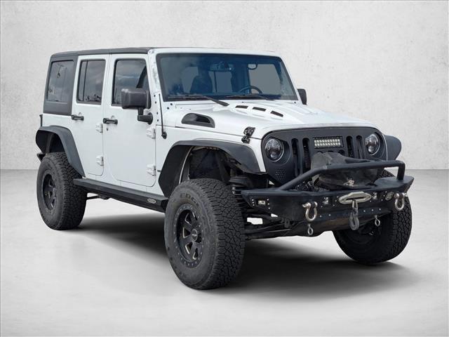 used 2016 Jeep Wrangler Unlimited car, priced at $20,991