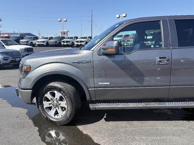 used 2014 Ford F-150 car, priced at $17,561