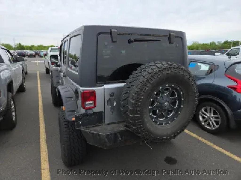 used 2014 Jeep Wrangler Unlimited car, priced at $9,950