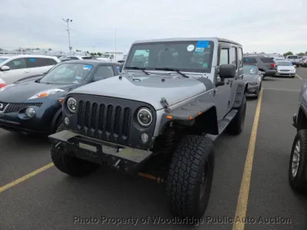 used 2014 Jeep Wrangler Unlimited car, priced at $9,950