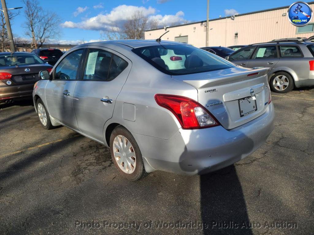used 2013 Nissan Versa car, priced at $2,950