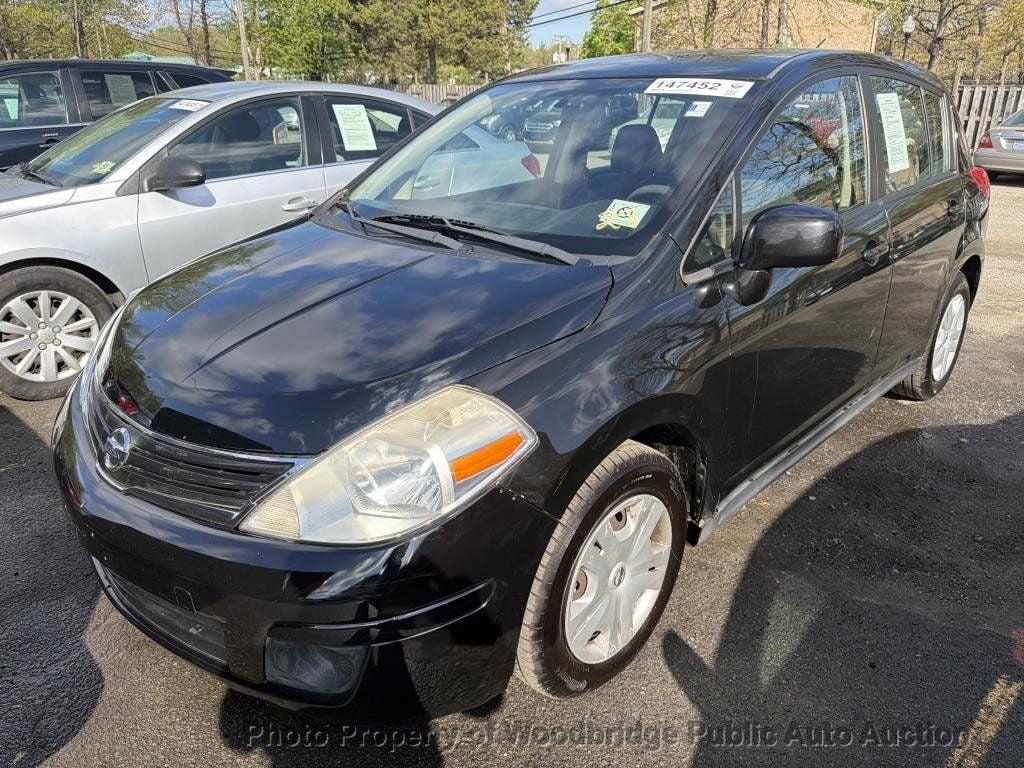 used 2011 Nissan Versa car, priced at $3,950