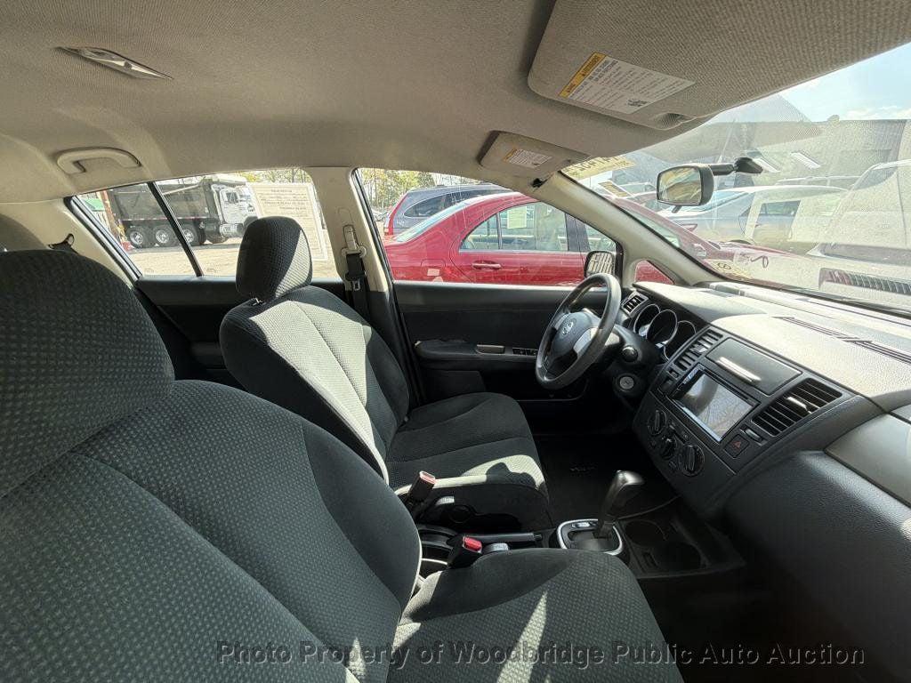 used 2011 Nissan Versa car, priced at $3,950