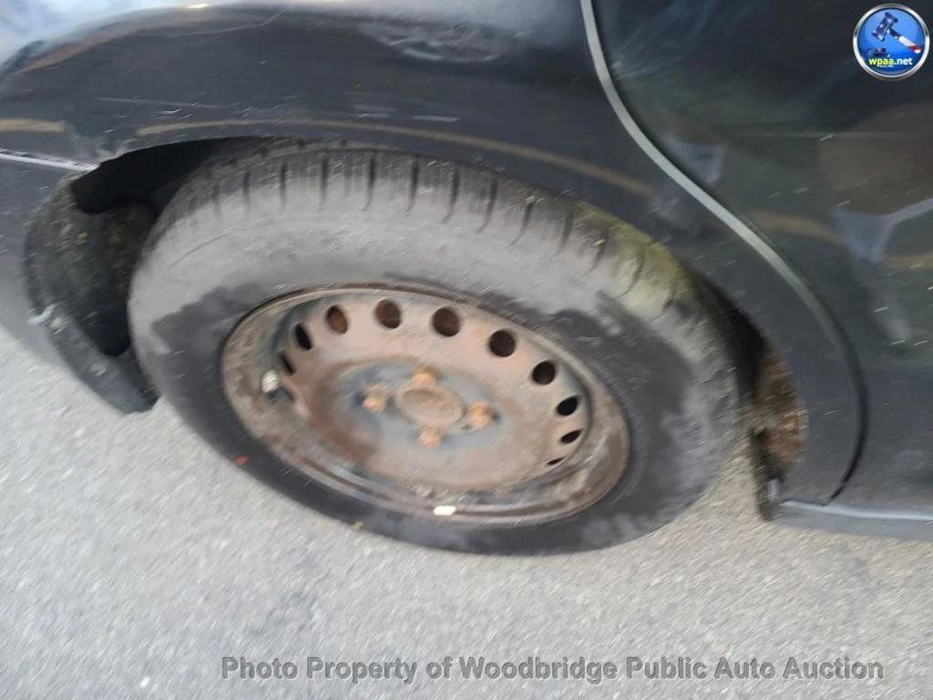 used 2008 Nissan Versa car, priced at $3,950