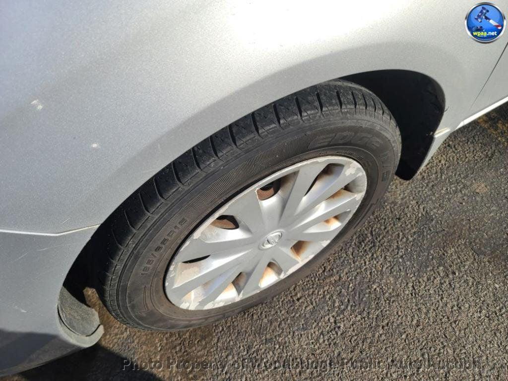 used 2013 Nissan Versa car, priced at $1,950