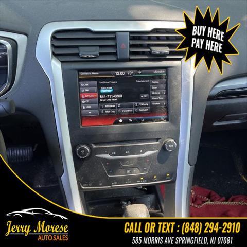 used 2015 Ford Fusion car, priced at $4,395