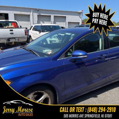 used 2015 Ford Fusion car, priced at $4,395