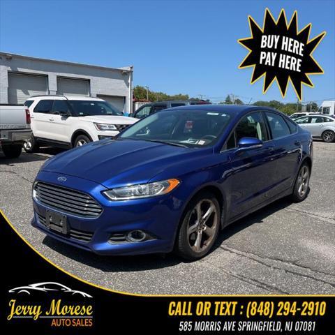 used 2015 Ford Fusion car, priced at $4,395