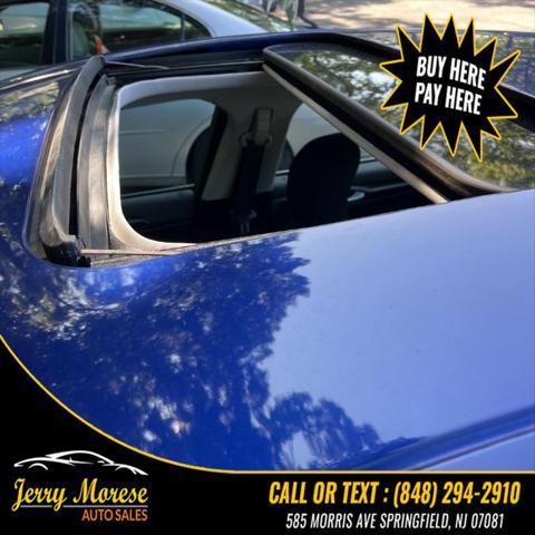 used 2015 Ford Fusion car, priced at $4,395