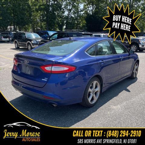 used 2015 Ford Fusion car, priced at $4,395