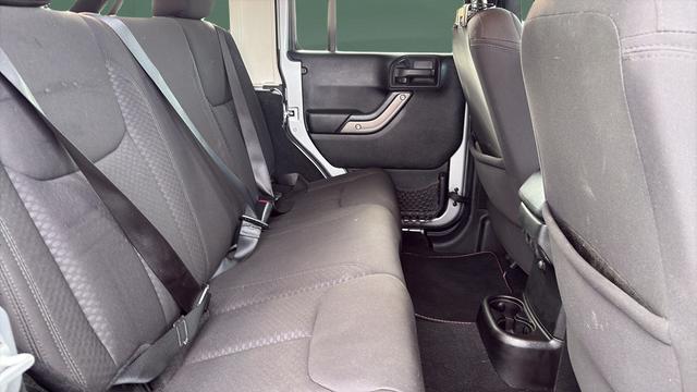 used 2013 Jeep Wrangler Unlimited car, priced at $16,798