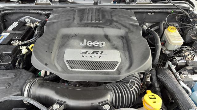 used 2013 Jeep Wrangler Unlimited car, priced at $16,798