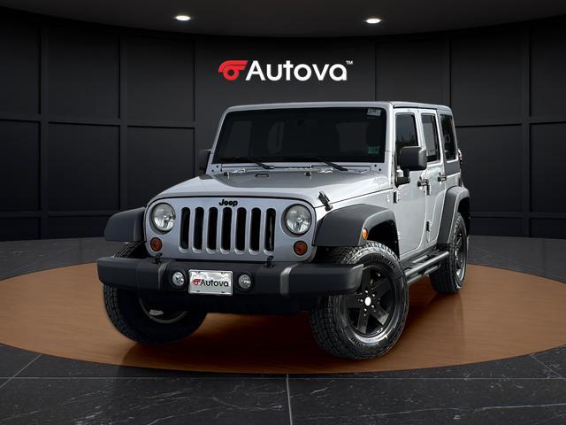 used 2013 Jeep Wrangler Unlimited car, priced at $16,798