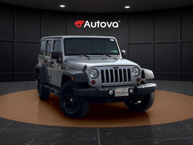 used 2013 Jeep Wrangler Unlimited car, priced at $16,798