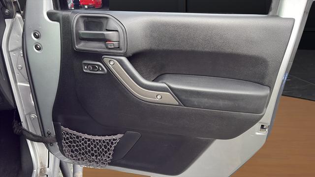 used 2013 Jeep Wrangler Unlimited car, priced at $16,798