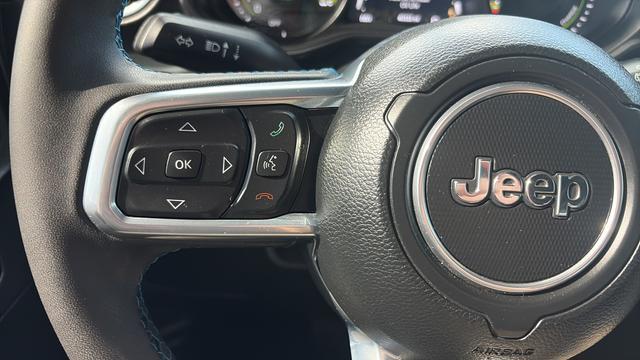 used 2024 Jeep Wrangler 4xe car, priced at $36,989