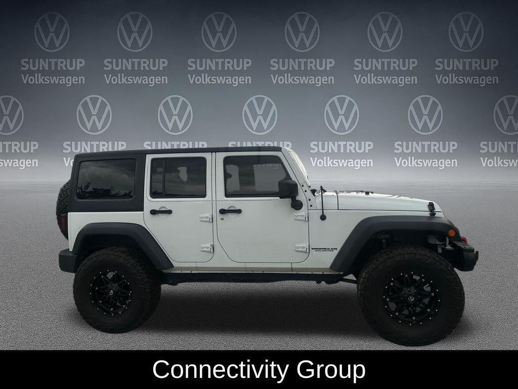 used 2016 Jeep Wrangler Unlimited car, priced at $20,518