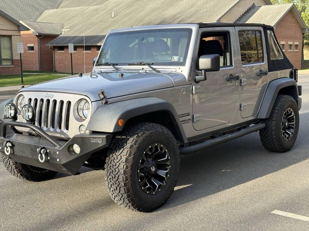 used 2014 Jeep Wrangler Unlimited car, priced at $16,495